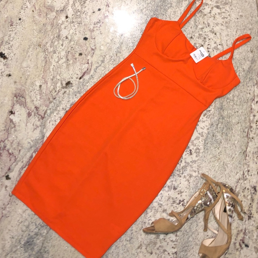 Orange form fitting dress